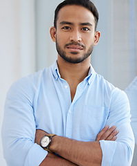 Image showing Portrait, accountant and business man with arms crossed in office, workplace or company. Face, confidence and serious Asian male professional, entrepreneur or auditor from Singapore with career pride