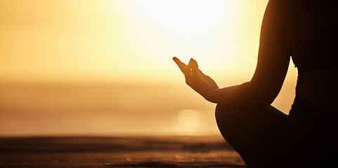 Image showing Silhouette, mockup and person doing meditation at the beach for wellness, health and zen or spiritual in morning sunrise. Balance, shadow and athlete meditate or yoga to be calm, workout and healthy