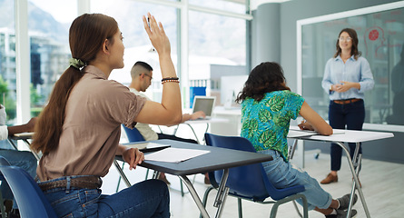 Image showing Student, question and woman in a classroom with lecture and studying for college. University class, learning and students with education professor and teacher on campus with a school group at desk