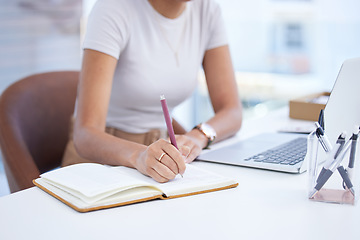 Image showing Business woman, hand and writing notes at a office desk with creative writer information. Content agency, paperwork and schedule planning of a female worker with a book, pen and article info at work