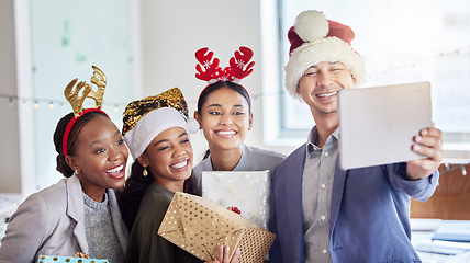 Image showing Christmas, selfie and tablet with business people in office for social media, celebration and xmas. Festive, holiday and community with friends at party for team building, diversity and support