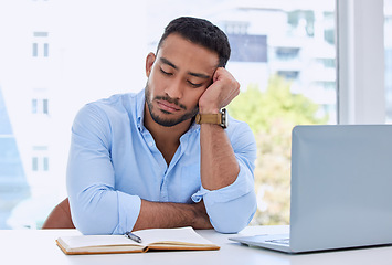 Image showing Tired, laptop and sleeping with business man in office for fatigue, exhausted and overworked. Mental health, burnout and frustrated with male employee napping at desk for problem, overtime and stress