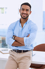 Image showing Business man, arms crossed and confident in portrait, success and professional mindset in workplace. Happy male employee at office, career mission and corporate job with empowerment and positivity