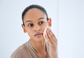 Image showing Beauty, face and woman doing a scrub for skincare, self love and cosmetic care for natural skin in the morning. Bathroom, cleaning and young female person clean or grooming with a product or sponge