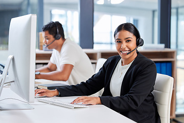 Image showing Call center, customer service and portrait of a woman consultant in the office for crm communication. Contact us, technology and female telemarketing agent working on online consultation with headset