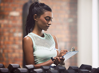 Image showing Entrepreneur, clipboard and woman in a gym, inventory and exercise with inspection for hygiene, checklist or startup. Female person, employee or athlete with documents, planning or training equipment