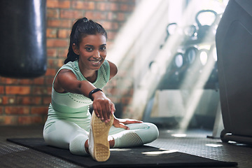 Image showing Gym, fitness or portrait of happy woman stretching legs for a workout or body movement for wellness. Smile, athlete or healthy girl smiling in exercise training warm up for flexibility or mobility
