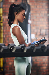 Image showing Personal trainer, gym or woman writing dumbbells or checking weights info for inspection checklist. Fitness business, girl or entrepreneur with inventory documents for training equipment monitoring