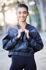 Image showing Fitness, nature or portrait of happy woman running in training, exercise or workout for wellness. Runner, motivation or healthy sports girl on exercising break in forest, park or woods with smile