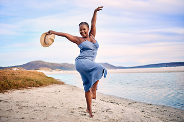 Image showing Portrait, excited and black woman dancing, beach and movement with happiness, tropical island or sunset. Face, female person or girl outdoor, travel or seaside holiday for stress relief, dance or joy