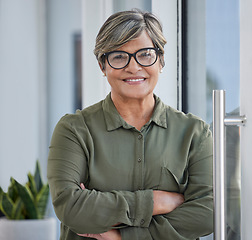 Image showing Portrait, arms crossed and business woman for workplace management, career mindset and happy job. Proud face of a senior person, employee or entrepreneur in office building, door or company welcome