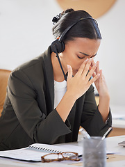 Image showing Call center, business and woman with a headache, burnout and customer service with health problem, office and tired. Female person, agent or consultant with a migraine, tech support and telemarketing