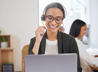 Image showing Woman, microphone and laptop in call center for customer service, support and telemarketing. Face of a african female agent or consultant talk on headset for sales, crm or help desk for online advice