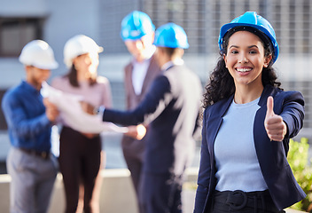 Image showing Business woman, portrait and architect with thumbs up in construction for winning, success or teamwork on site. Happy female engineer with thumb emoji, yes sign or like for approval in architecture