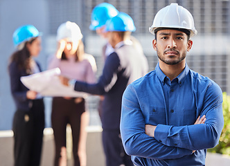 Image showing Businessman, portrait and architect with arms crossed in leadership, management or team construction on site. Confident and serious man, engineer or manager with hard hat for industrial architecture