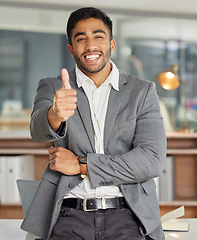 Image showing Portrait, happy and business man with thumbs up in office for success, yes and thank you gesture. Face, smile and male lawyer with hand, sign and positive feedback, review or vote at startup law firm