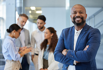 Image showing Black business man, portrait and office team with teamwork feeling success and motivation. Male ceo smile, arms crossed with professional corporate management with staff talking at a workplace
