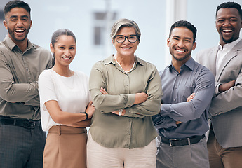 Image showing Diversity, portrait of businesspeople and their arms crossed in a office at their workplace. Motivation or achievement, collaboration and happy colleagues smiling for success together at work