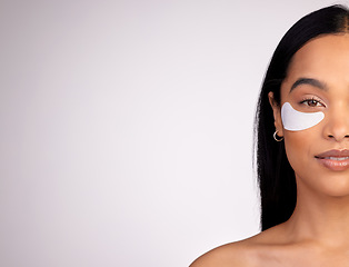 Image showing Woman, portrait and eye patches on mockup for skincare, beauty or dermatology against a grey studio background. Happy female person or model with patch under eyes in healthy wellness on mock up space