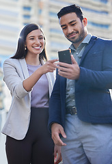 Image showing Phone, business people and team outdoor in a city with internet connection for social media. A happy man and woman together on urban background with smartphone for networking, communication or app