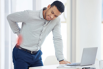 Image showing Businessman, laptop and back pain in burnout, stress or inflammation and mental health by office desk. Fatigue or tired man with painful area from accident, rear ache or bad posture at the workplace