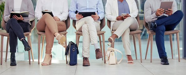 Image showing Business people, waiting room chair and interview with phone, tablet and notebook for info, research or preparation. Men, women and technology for reading, job opportunity or recruitment at hr agency