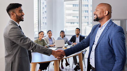 Image showing Meeting, smile and hand shake with businessmen in office, b2b deal or agreement for startup opportunity. Handshake, partnership and welcome, happy man shaking hands with boss and onboarding with team