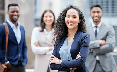 Image showing Business woman, city portrait and arms crossed outdoor with leadership and management success. Professional, team and group with a smile from company diversity and solidarity for corporate work