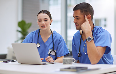 Image showing Teamwork, laptop and medical with doctors in hospital boardroom for planning, research and help. Medicine, healthcare and collaboration with man and woman for strategy, internet and meeting