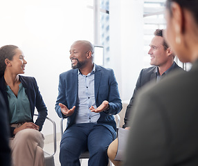 Image showing Business, meeting and black man in discussion circle at office for team building, planning and collaboration. Group, diversity and happy management in a huddle for conversation, workshop and training