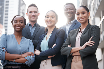 Image showing Diversity, portrait of businesspeople and arms crossed with smile outdoors against a city background with a lens flare. .Teamwork, collaboration and happy colleagues standing together smiling