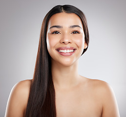 Image showing Woman in portrait, hair and beauty with hairstyle and shine, haircare and growth isolated on studio background. Female model with smile, keratin treatment and cosmetic care, texture and glossy