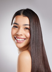 Image showing Hair, haircare and happy woman with beauty and salon hairstyle, cosmetic care and portrait isolated on studio background. Female model with smile, shine and growth, Brazilian or keratin treatment