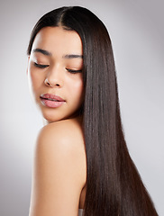 Image showing Hair, hairstyle and woman with beauty and salon haircare, cosmetic care and elegance isolated on studio background. Female model with growth, shine and glossy with Brazilian or keratin treatment