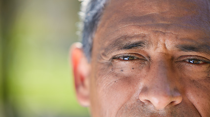 Image showing Eyes, vision and closeup of elderly man, face and wisdom with focus, insight and thinking with mockup space. Old male person outdoor, perspective or point of view with eyesight and thoughtful