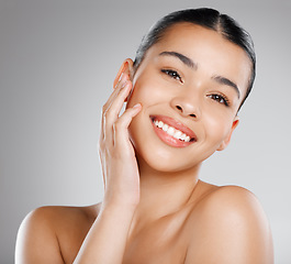 Image showing Skincare, natural beauty and happy woman portrait with cosmetics, confidence and dermatology. Female model, smile and youth with a young and happy face closeup and cosmetics treatment in a studio