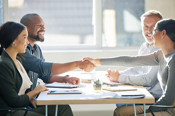 Image showing Happy business people, handshake and meeting for agreement, partnership deal and office collaboration. Team shaking hands for success, contract and congratulations of promotion, onboarding and praise