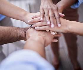 Image showing Team building, hands and people in solidarity, collaboration and circle of trust for motivation. Closeup, community and helping hand of group, support and target for success, mission and partnership