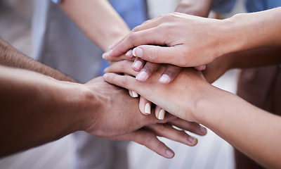 Image showing Teamwork, hands and people in collaboration, support and circle of trust for motivation together. Closeup, community and helping hand of group, volunteers and goals for success, mission and synergy