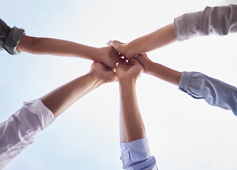 Image showing Team building, hands and people high five in collaboration, support and circle of trust for motivation from below. Closeup, group and helping hand for success, mission and celebration of cooperation