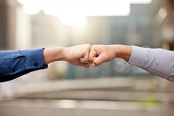 Image showing Fist bump, hands and business people with collaboration, partnership or support with goals, teamwork or growth. Closeup, staff or coworkers with hand gesture, unity or trust with cooperation and deal