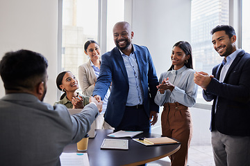 Image showing Meeting, smile and handshake with welcome, business people in office and b2b deal or agreement at startup opportunity. Celebrate, partnership and success, happy welcome or promotion and shaking hands