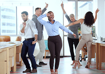 Image showing Office, celebration and excited business people dance for success, achievement and team building. Corporate, collaboration and happy men and women dancing in workplace to celebrate bonus or profit