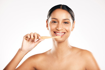 Image showing Happy woman, portrait and toothbrush for clean teeth or dental hygiene against a white studio background. Female person or model with tooth brush and smile for oral, mouth or gum care on mockup space