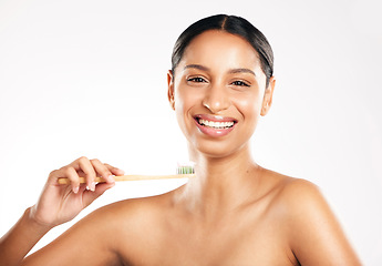 Image showing Happy woman, portrait and toothbrush for teeth, dental or clean hygiene against a white studio background. Female person or model with tooth brush and smile in oral, mouth or gum care on mockup space