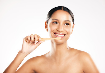 Image showing Happy woman, toothbrush and brushing teeth for dental or clean hygiene against a white studio background. Female person or model with tooth brush and smile for oral, mouth or gum care on mockup space