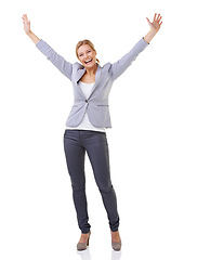 Image showing Celebrating her success. A beautiful woman with her arms raised isolated on white.
