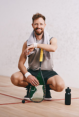 Image showing .Portrait of a young man taking a break after playing a game of squash.