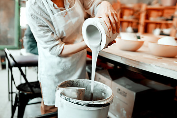 Image showing I work with all kinds of clay. Cropped shot of an unrecognizable artisan working in a pottery workshop.