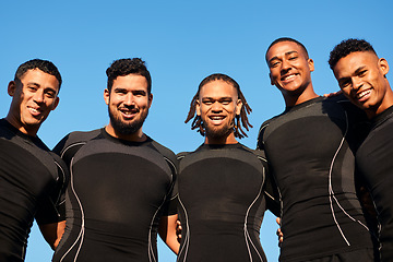 Image showing Its a beautiful day for rugby. Cropped portrait of a diverse group of sportsmen standing together before playing rugby during the day.